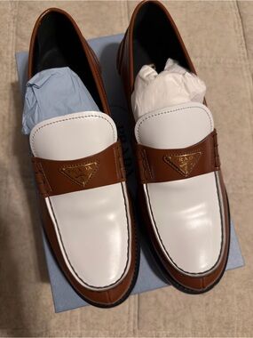 Prada women Two-Tone White and Brown Leather Penny Loafers . Size 11 ( 41 )
